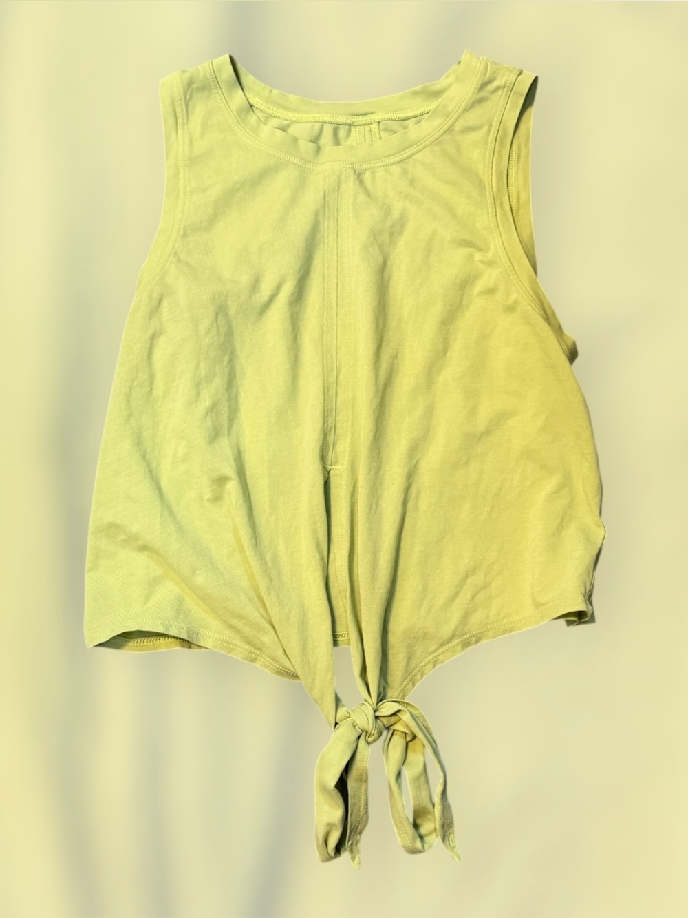Lululemon cotton top with tie in front of